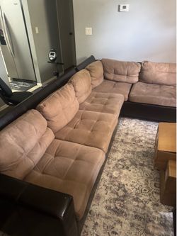 Brown L shape couch