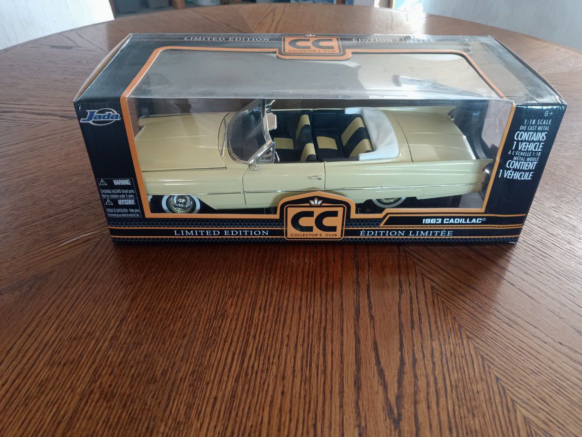 PRICE REDUCED Collector Edition Model Car  1963 Cadillac Series 62 Convertible Yellow In Box 1:18.