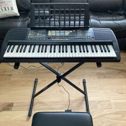 Yamaha Piano keyboard (Carrying case, Bench, Stand Included)