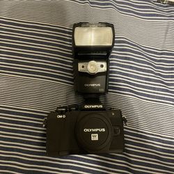 Olympus OM-D E-M10 (body) with flash attachment!