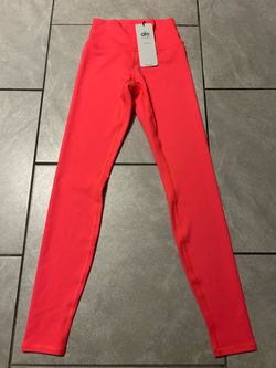 Alo Yoga 7/8 High-Waist Airlift Leggings in a vibrant fluorescent pink coral color. XS $75 firm