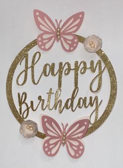 Custom cake toppers or flower arrangement toppers