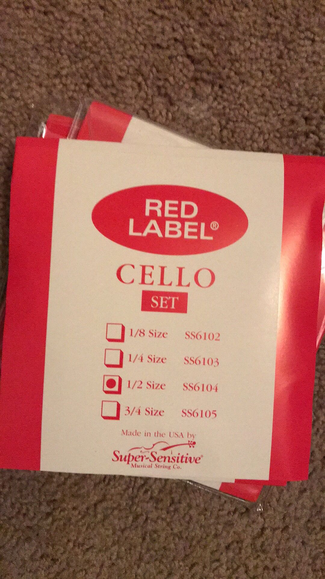 Red Label brand cello strings. Various sizes