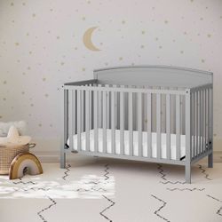 Changing table + crib + mattress