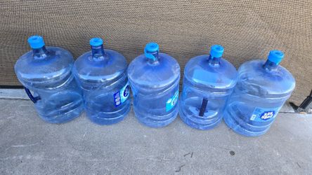 5   PLASTICS  WATER BOTTLES 5 GALLONS