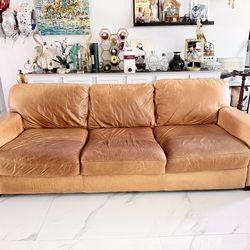 Tan leather three cushion sofa couch