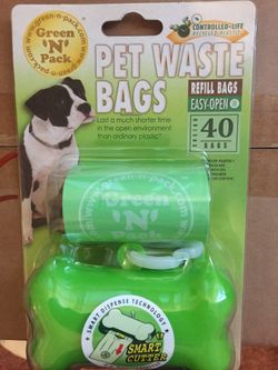 Pet waste dispenser with bags.