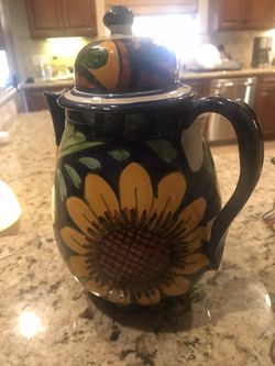 Home pitcher/teapot. 10 inches. Three other pieces included not Talavera. 40 dollars
