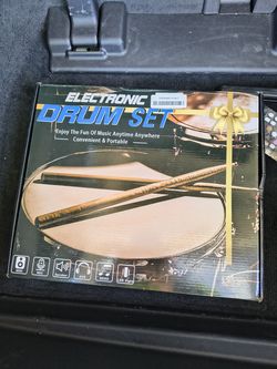 electric drum kit with extra drumsticks