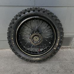 Tuttio rim with tire