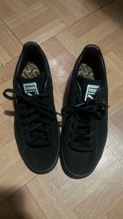 Black Puma Suedes