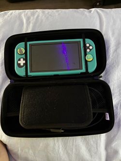 Nintendo Switch Lite – Excellent Condition Bundle (Teal)