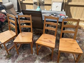 Set of 4 Solid Wood Dining Chairs (negotiable price)