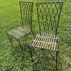 2 Cast Iron Chairs