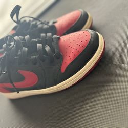 Nike Jordan’s  Red And Black Low Top 1s
