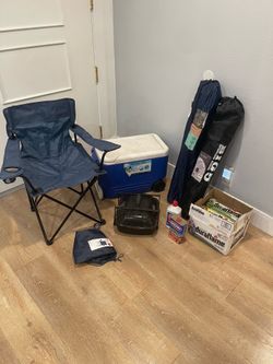 3 foldable chairs, 1 cooler with wheels, mini grill and 6 duraflame fire logs