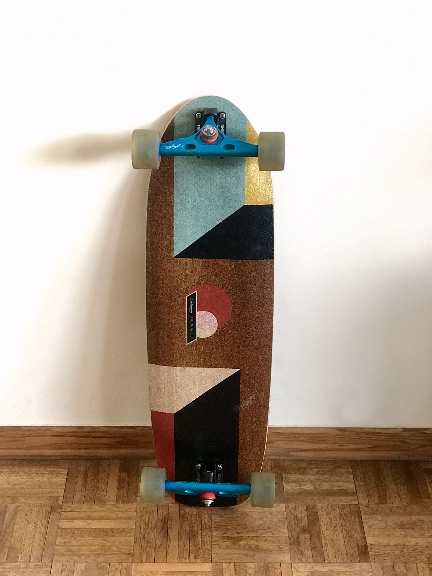 Loaded truncated tesseract longboard skateboard