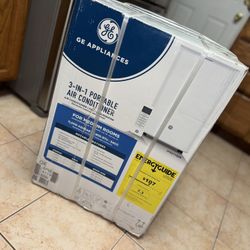 **GE Appliances**3-in-1 portable air conditioner, fan, and dehumidifier with electronic controls and remote.