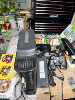 Xbox 360 with accessories and games. Do not think unit works
