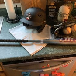 Baseball equipment package including Franklin 10.5” baseball glove model 4626, Rawlings like new batting helmet size 6 3/8” to 7 1/8” 2 baseballs Rawl