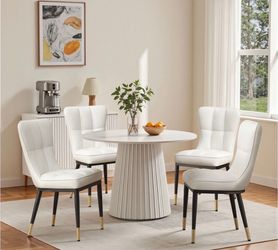 Set of 4 dining chairs new in box!!