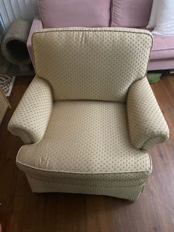 Beige arm chair with foot rest