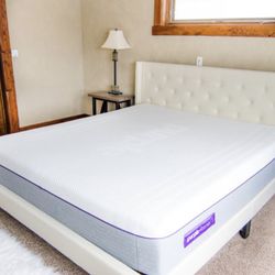 Purple mattress like new. With pillows and bedding