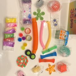 Lot Of 250 Fidget toy 35Pcs in a retail box NEW 250 Retail Boxes