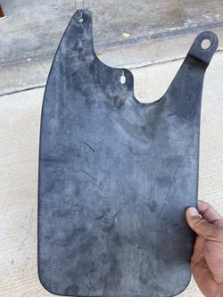 2004 Toyota Tacoma OEM left rear Mud flap.