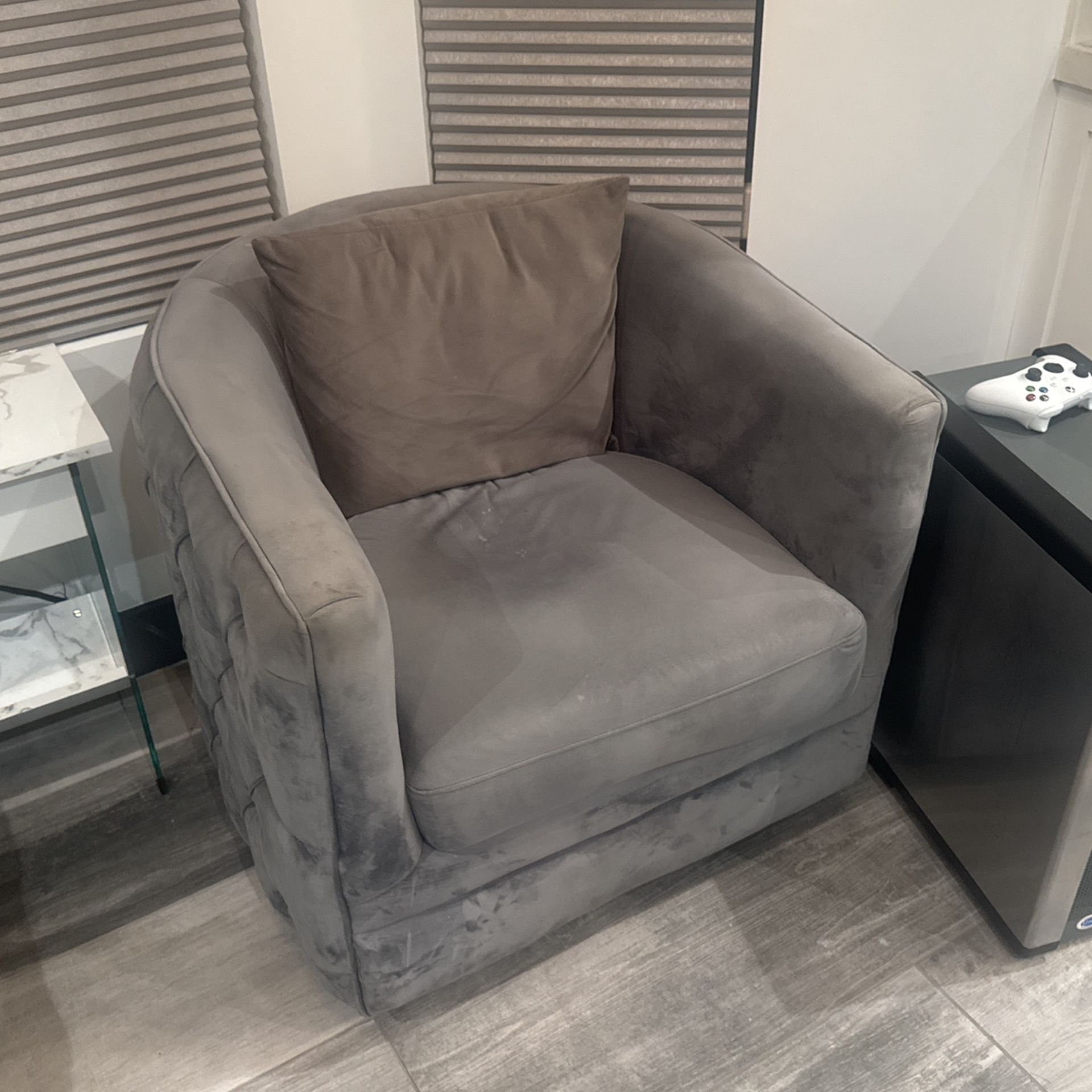 Grey tufted barrel chairs