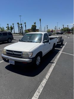 2000 Toyota Tacoma combo with trailer