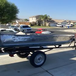 14ft Alumicraft With Trailer