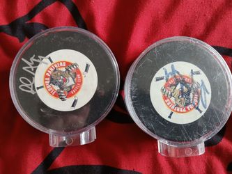 Florida Panthers Autographed Hockey Pucks