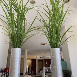 2 silver cylinder artificial green leaf planter.