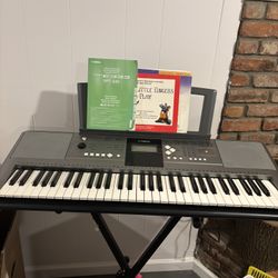 Yamaha electronic keyboard with stand