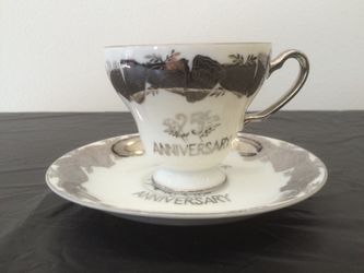 Beautiful silver embellished 25th anniversary cup and saucer