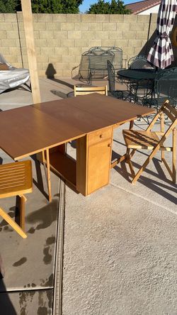 Folding table with chairs