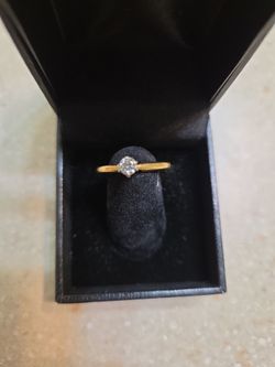 10 k gold diamond ring.  Weight is 1.7 grams