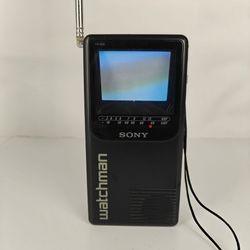 vintage Sony Watchman FD-230, a portable, handheld black-and-white television set