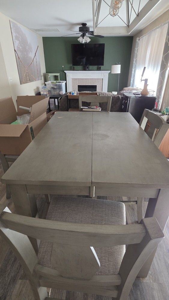 Dining Table (Expands To Large Square) And 4 Chairs