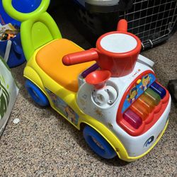 Fisher price ride On Car With Piano
