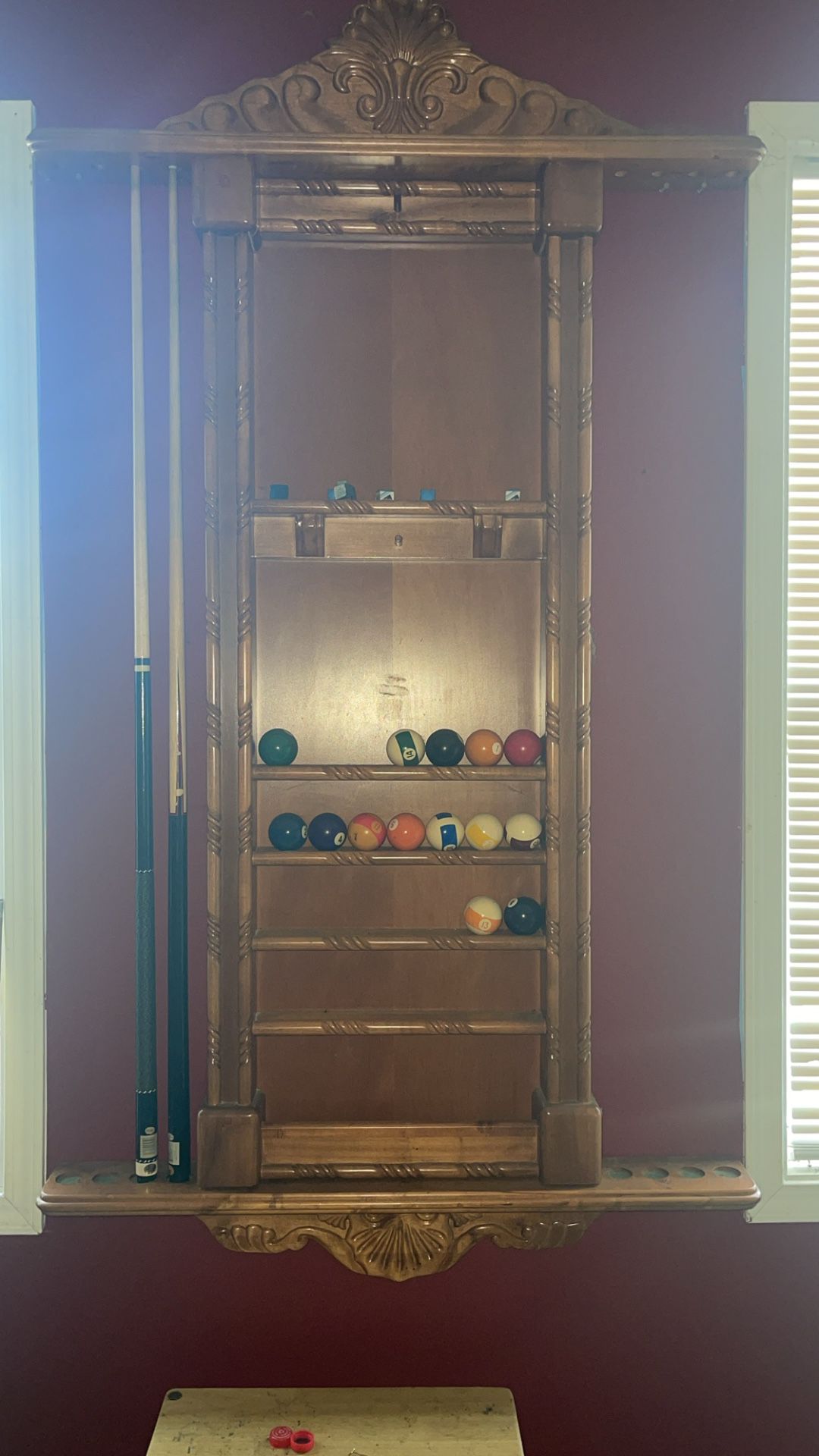Wooden wall poolstick holder