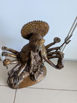 Hindu goddesse Kali with multiple arms  14 inches. Brass o bronze