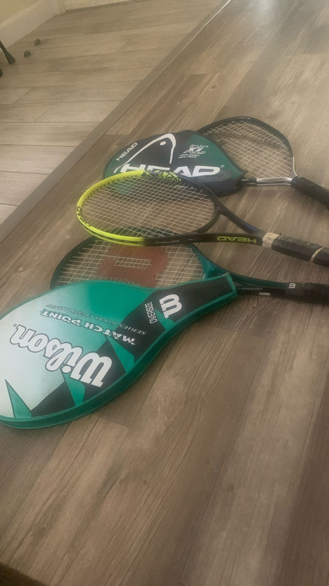 Two Head Pros One Wilson Match point Tennis Racket