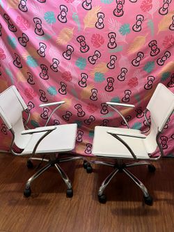 Two Swivel Chairs 