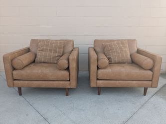 Tan Leather Club Chairs with Pillows each