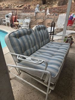 Outdoor loveseat glider