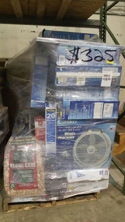 Gm pallet with fans and exercise machine on it along with extra