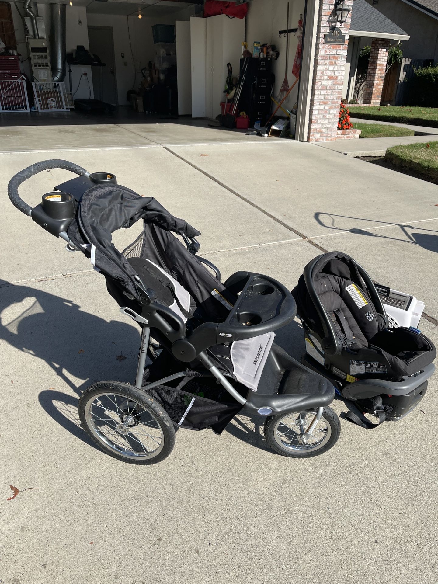 Three Wheel Stroller And Baby Seat 