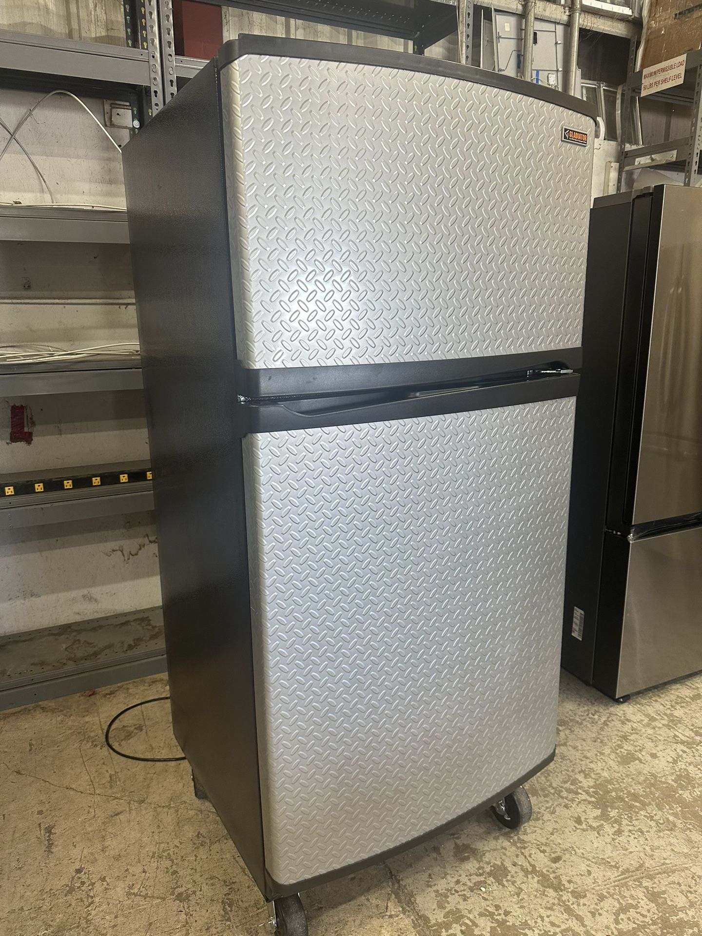 Gladiator Whirlpool, 21.0 cu. ft. Freezerator Convertible Freezer/Refrigerator Can be converted to be all freezer Can deliver Retail price $1500